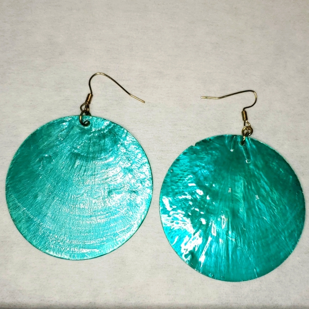 Round Turquoise colored used fashionable earrings